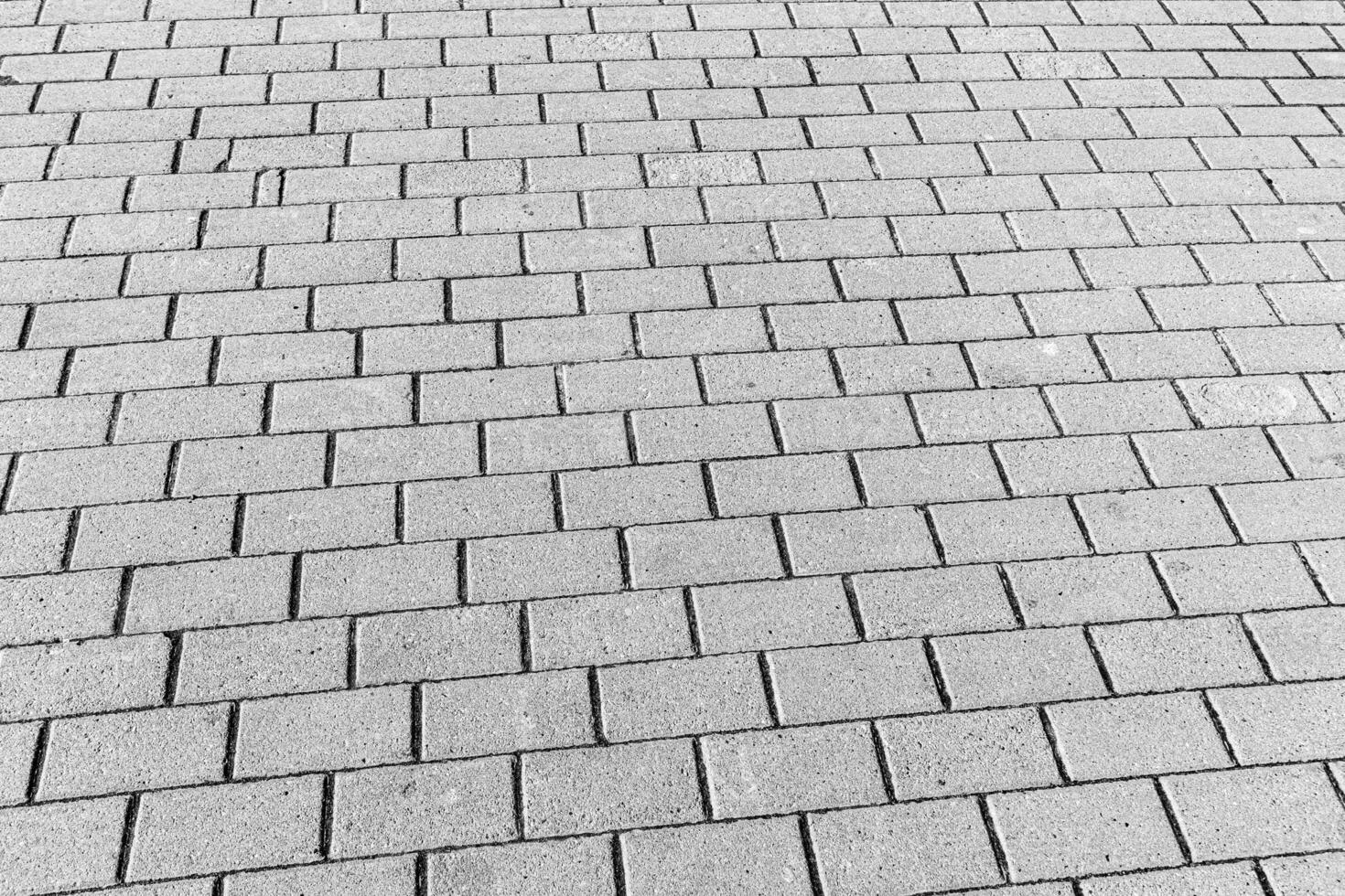 Texture of a paving stone road. Abstract background for design. photo