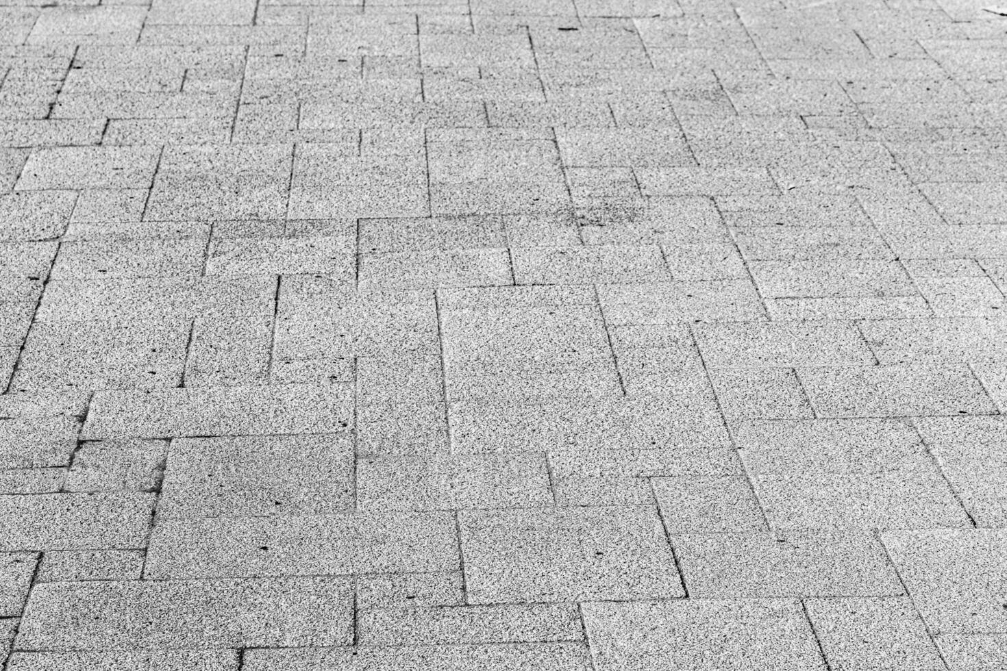 Texture of a paving stone road. Abstract background for design. photo