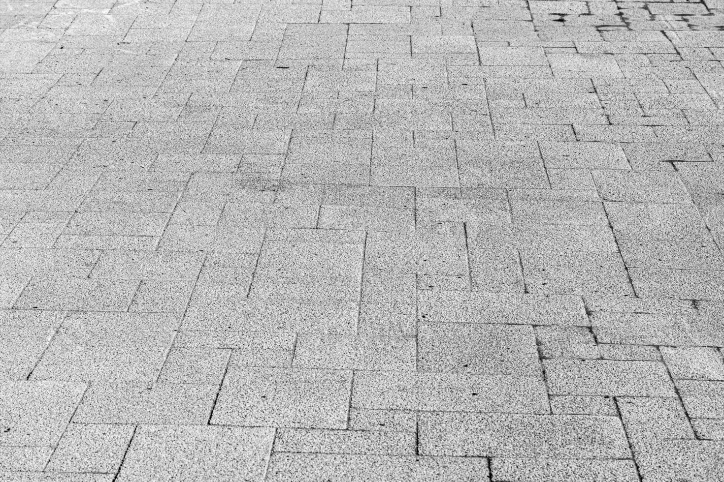 Texture of a paving stone road. Abstract background for design. photo