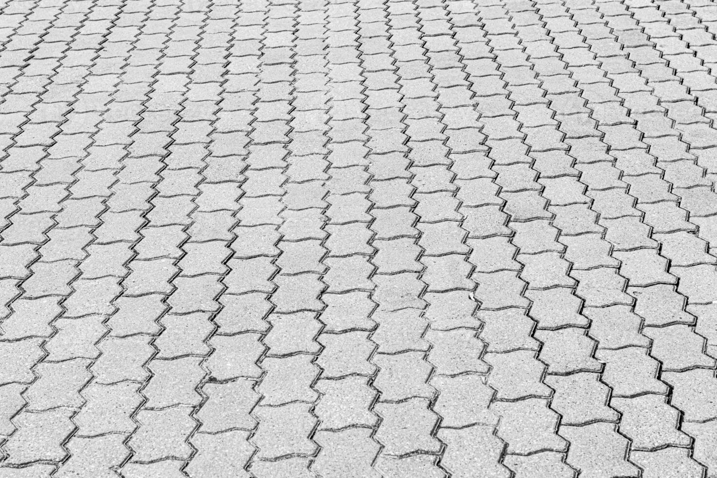Texture of a paving stone road. Abstract background for design. photo
