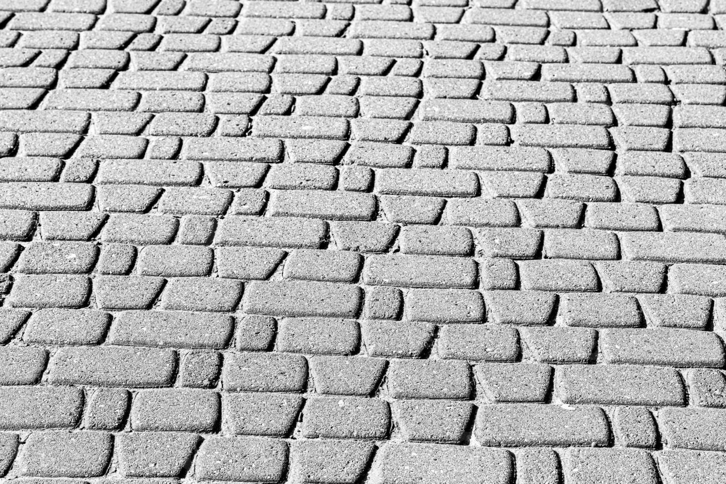 Texture of a paving stone road. Abstract background for design. photo