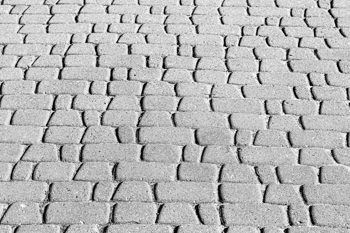Texture of a paving stone road. Abstract background for design. photo