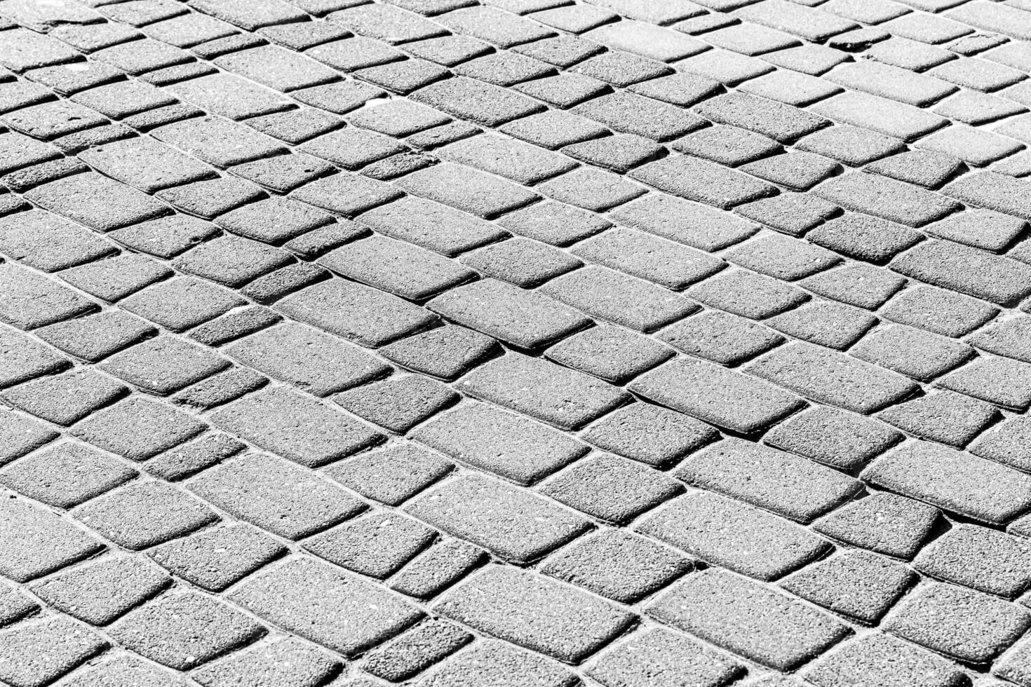 Texture of a paving stone road. Abstract background for design. photo