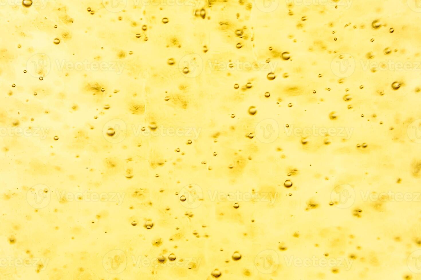 Texture of gas bubbles in light beer. photo