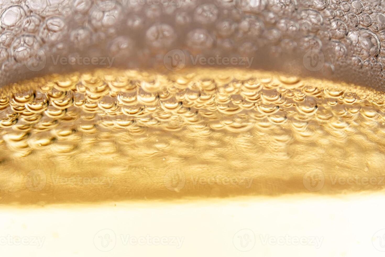 Texture of gas bubbles in light beer. photo
