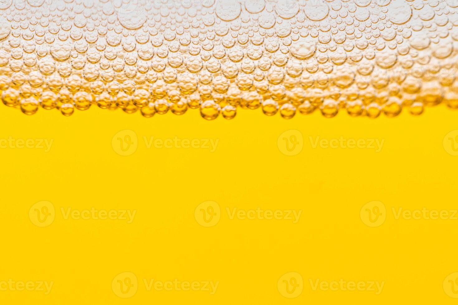 Texture of gas bubbles in light beer. photo