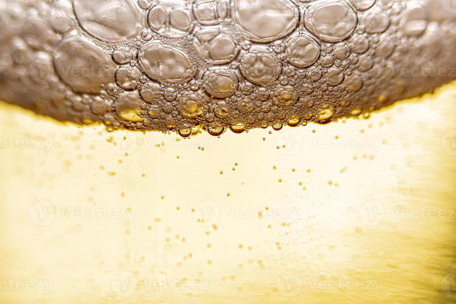 Texture of gas bubbles in light beer. photo