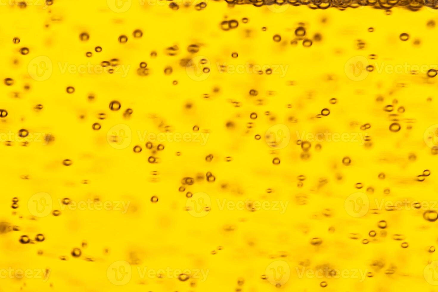 Texture of gas bubbles in light beer. photo