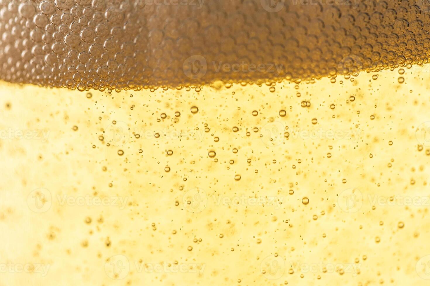 Texture of gas bubbles in light beer. photo
