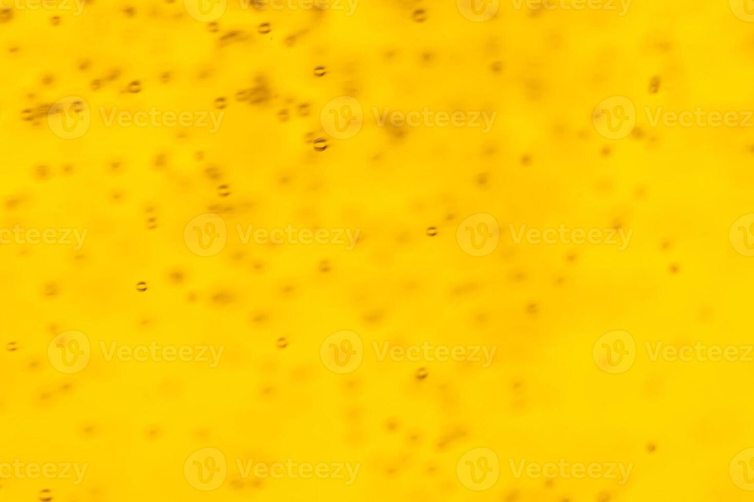 Texture of gas bubbles in light beer. photo