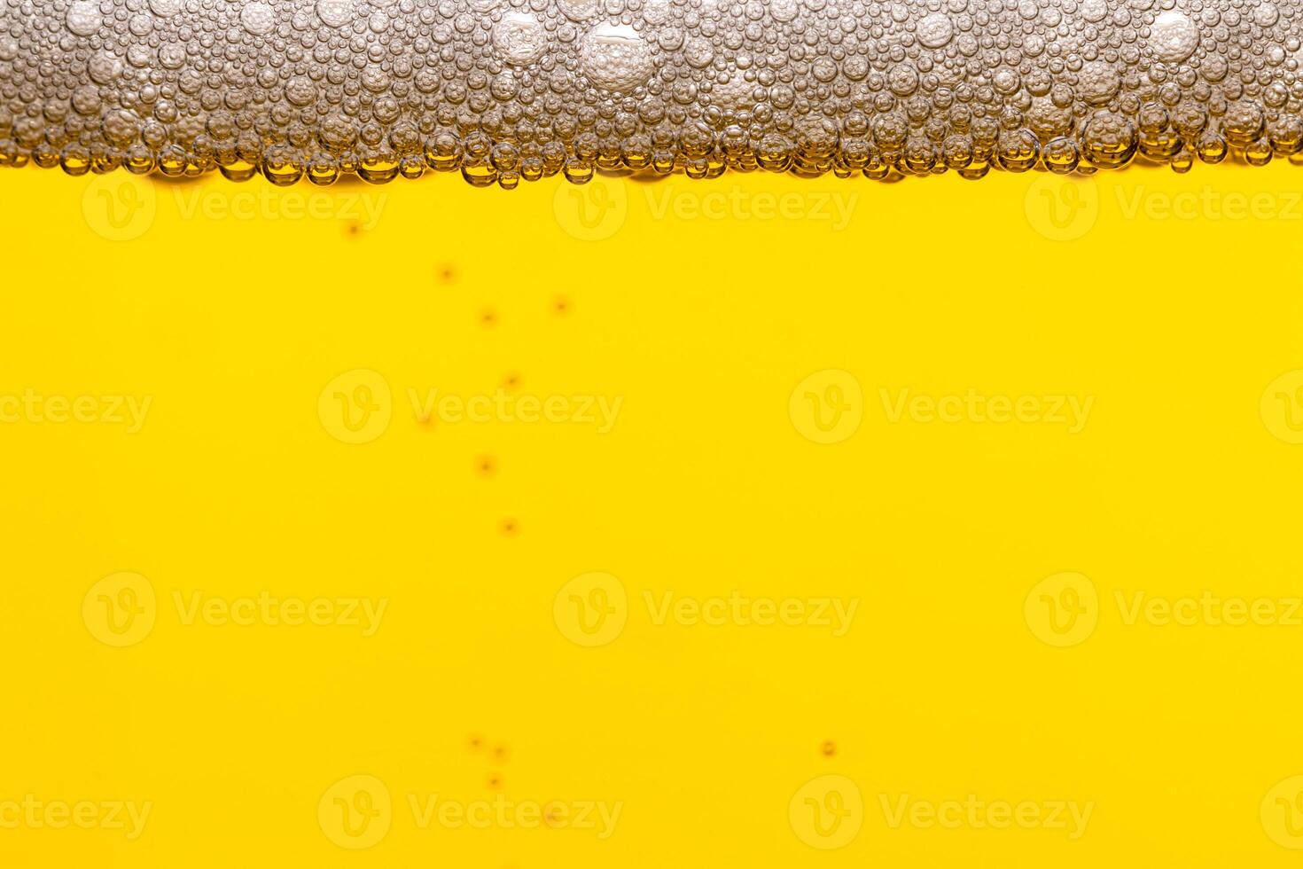 Texture of gas bubbles in light beer. photo