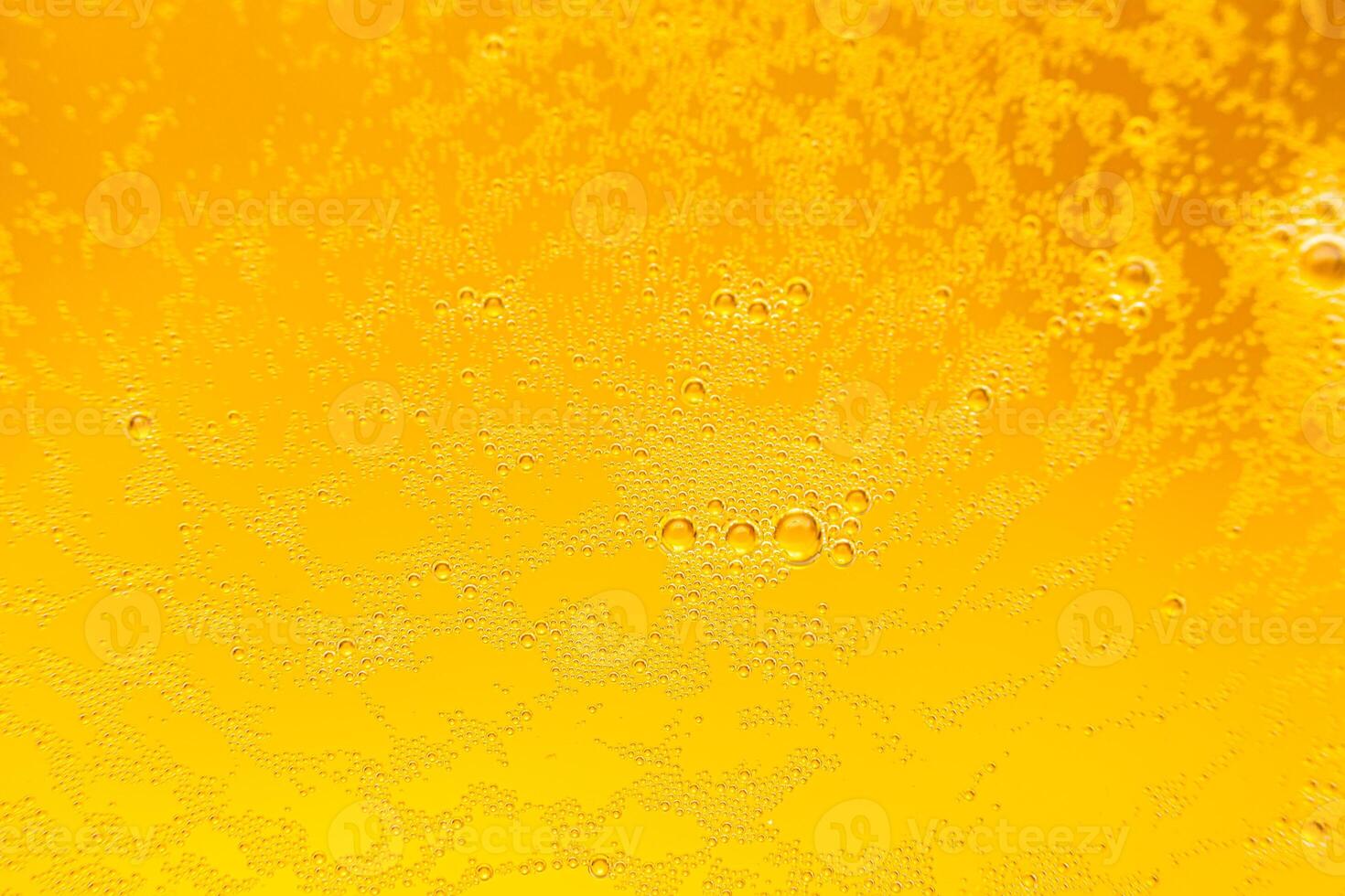 Texture of gas bubbles in light beer. photo