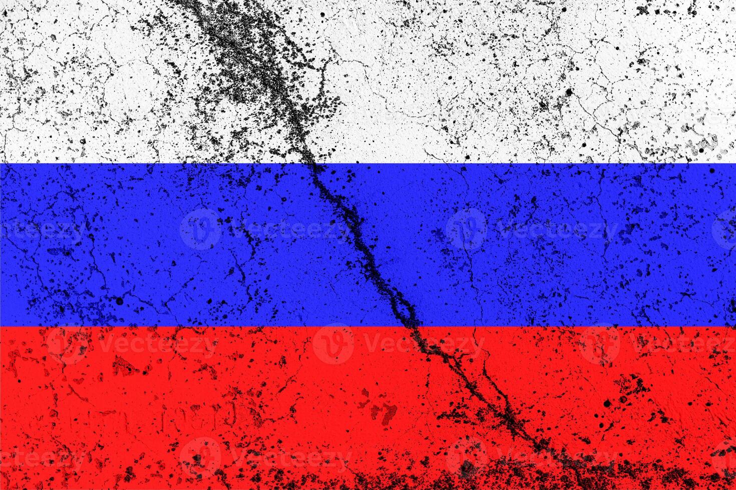 Russian Federation flag on cracked concrete wall. The concept of crisis, default, economic collapse, pandemic, conflict, terrorism or other problems in the country. Abstract disaster symbol. photo