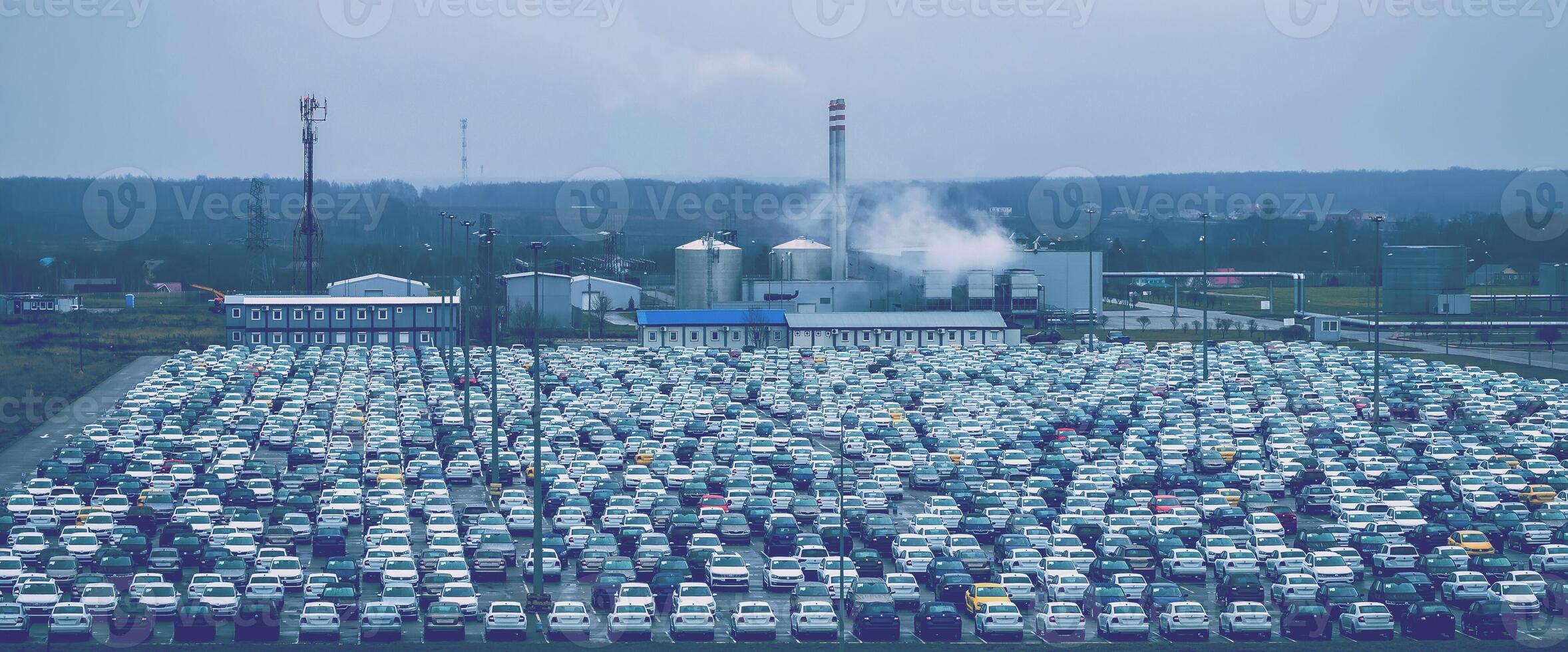 New cars parked at distribution center photo
