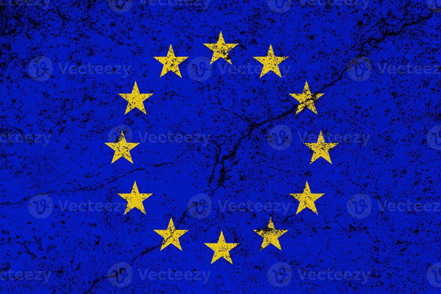 European Union flag on cracked concrete wall. The concept of crisis, default, economic collapse, pandemic, conflict, terrorism or other problems in the country. Abstract disaster symbol. photo