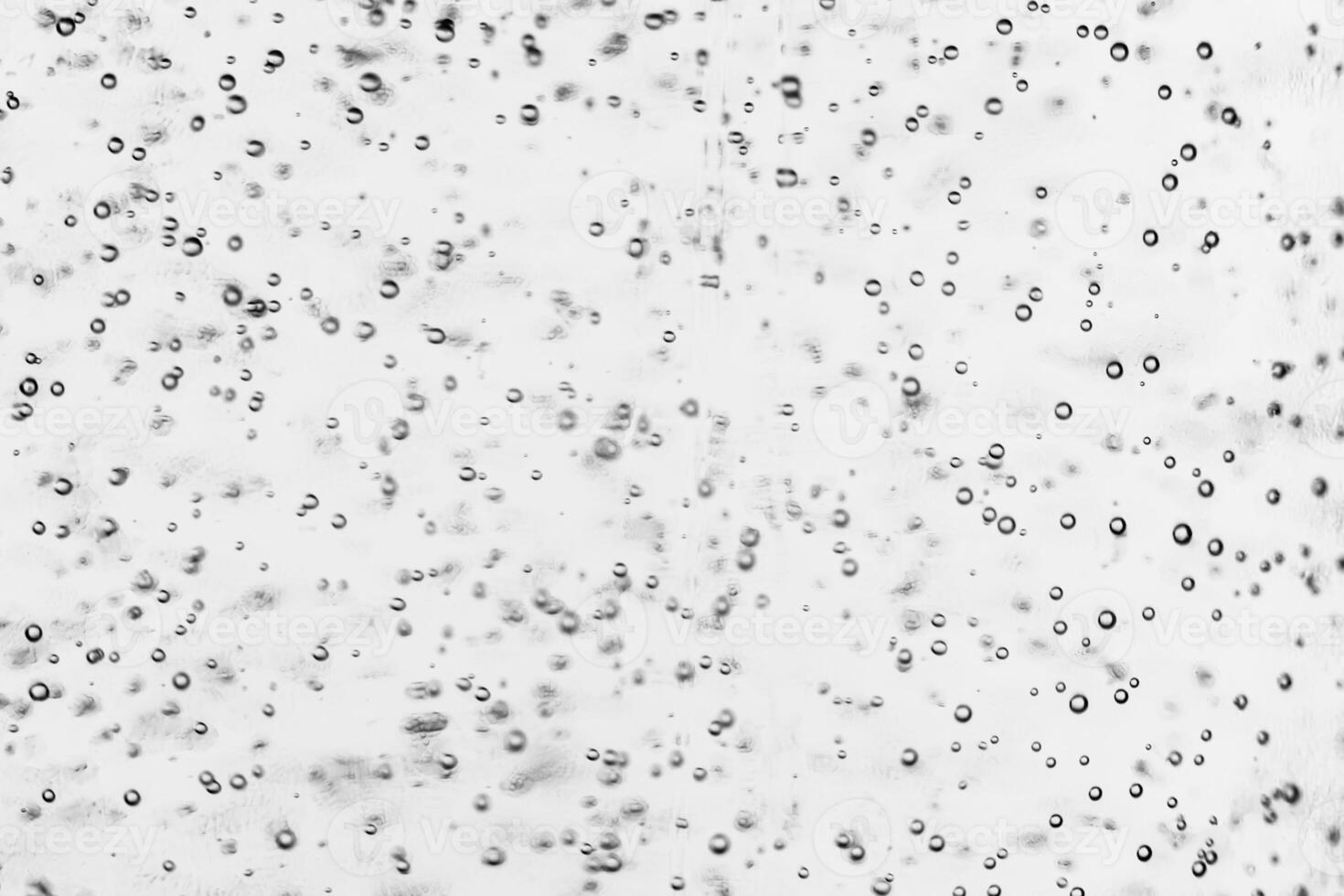 Monochrome background with air bubbles in the liquid. Carbonated drinks. Abstract backdrop. photo