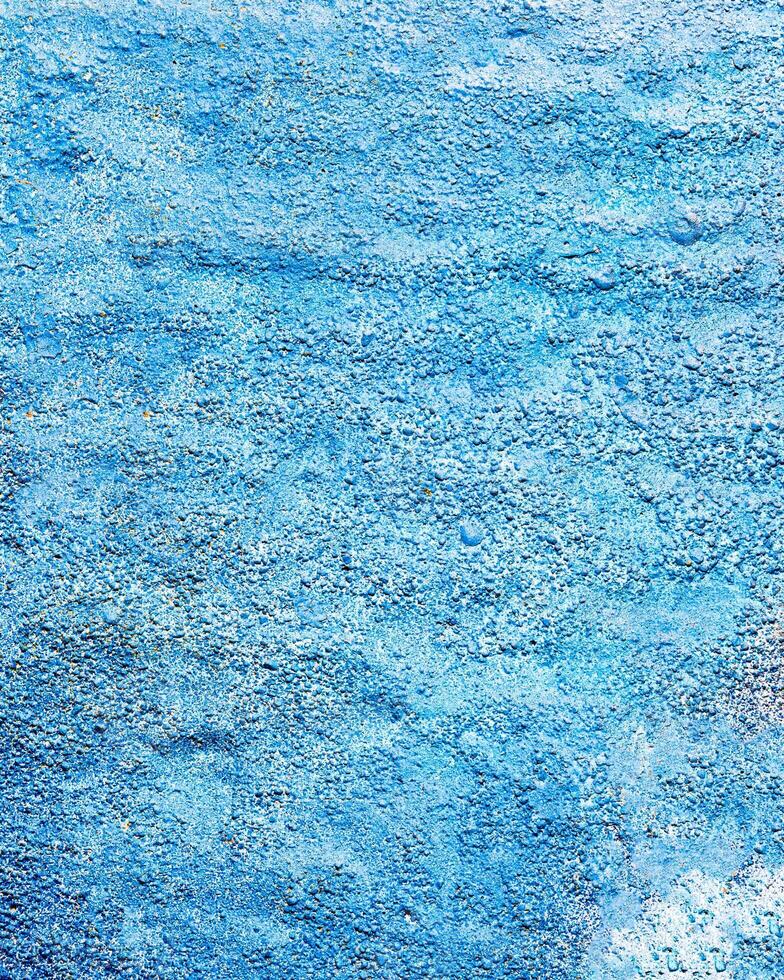 Fragment of colored graffiti painted on a wall. Bright abstract background for design. Spray pictures. photo