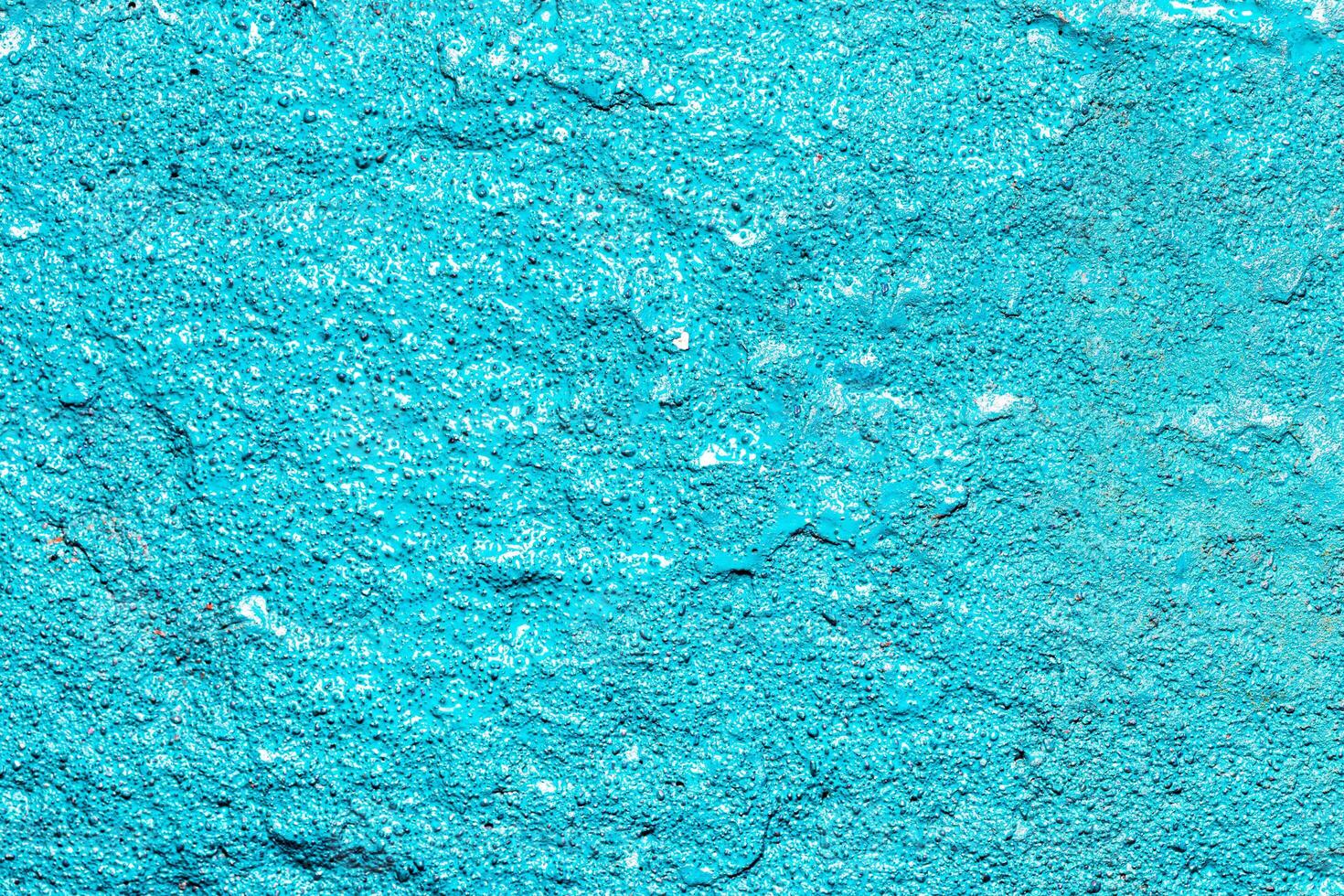 Fragment of colored graffiti painted on a wall. Bright abstract background for design. Spray pictures. photo