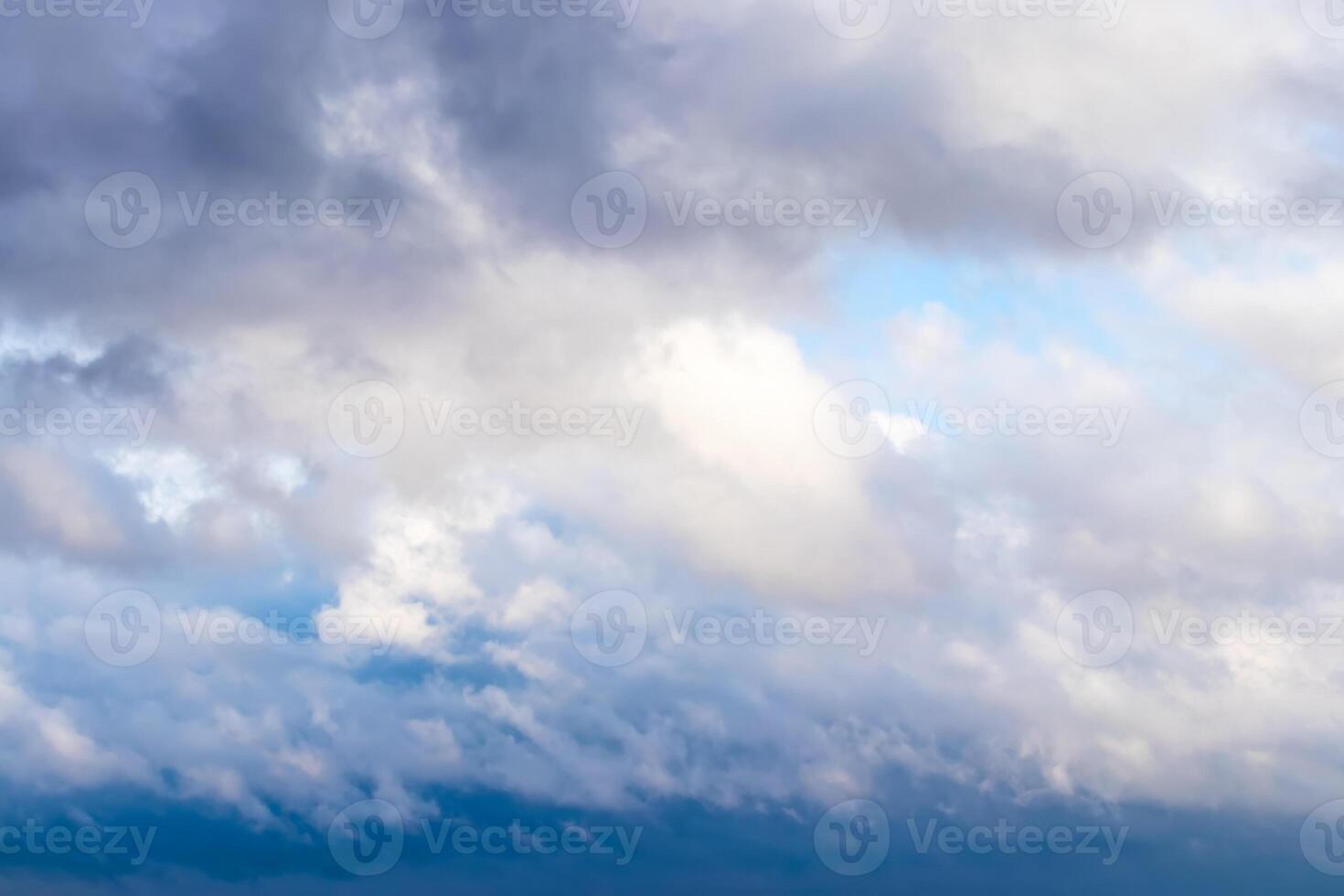 Cumulus clouds in the sky in cloudy weather. Abstract background. photo