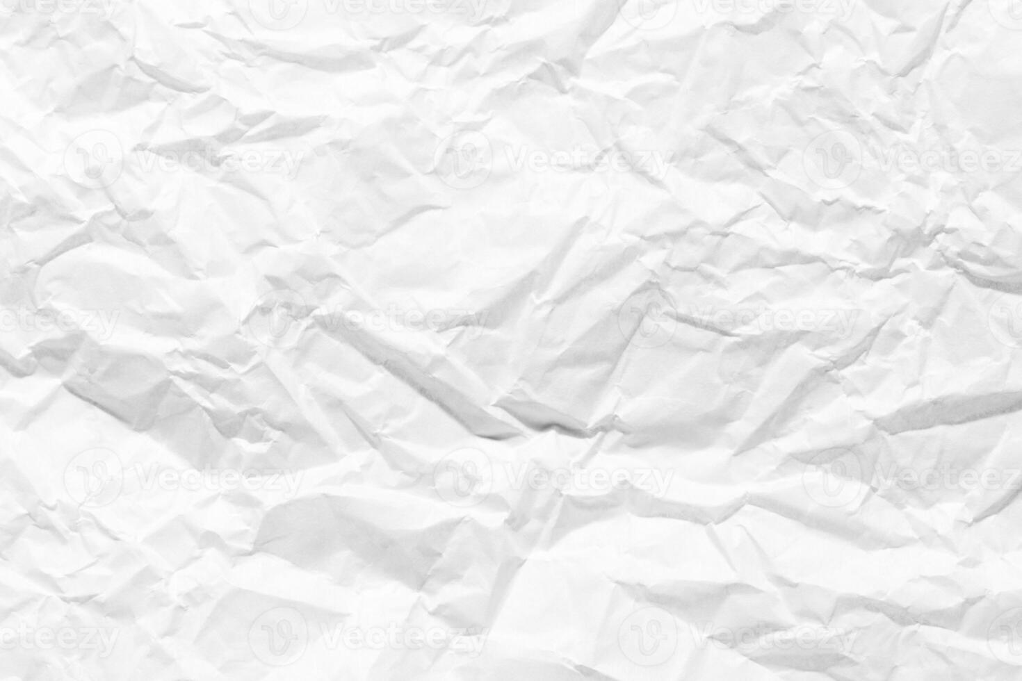 Texture of crumpled white parchment or paper. Abstract background for design. Blank with copy space. photo