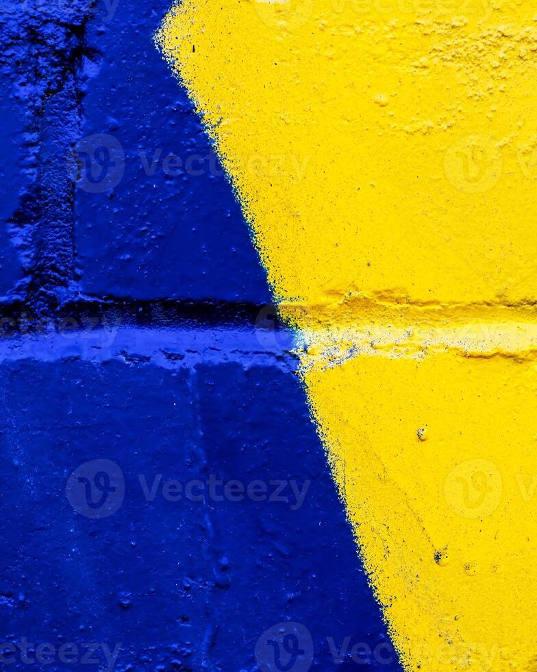 Fragment of colored graffiti painted on a wall. photo