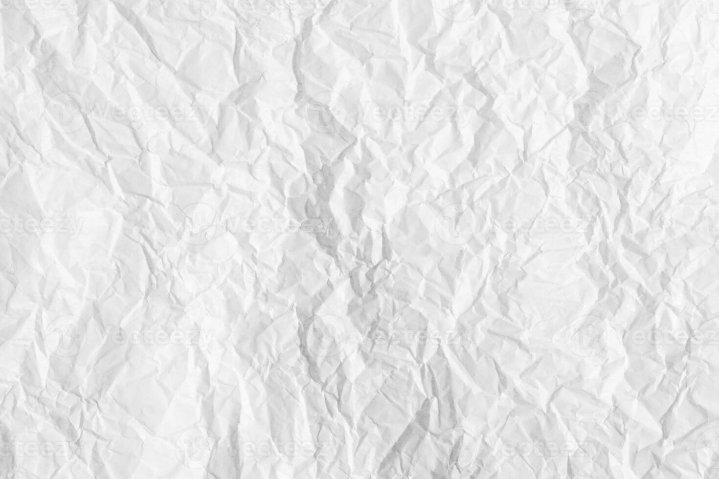 Texture of crumpled white parchment or paper. Abstract background for design. Blank with copy space. photo