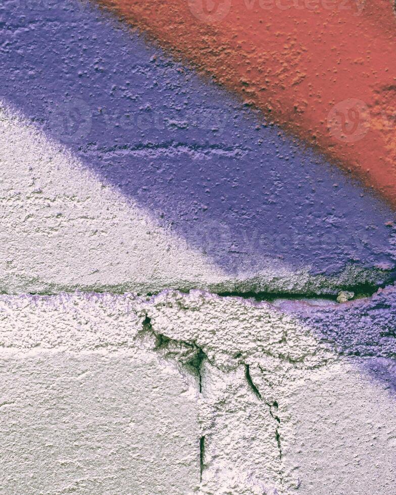 Fragment of colored graffiti painted on a wall. photo