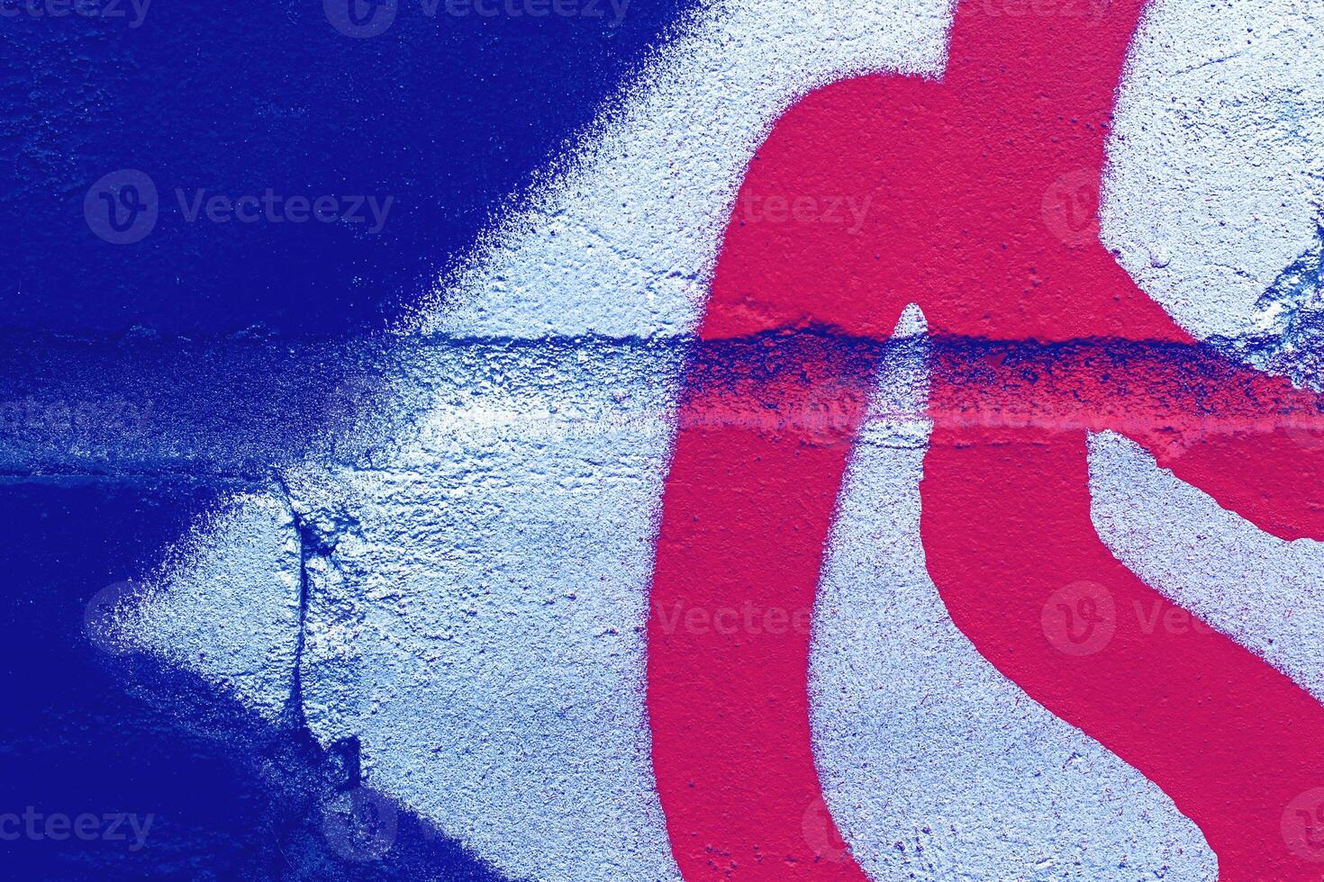 Fragment of colored graffiti painted on a wall. photo