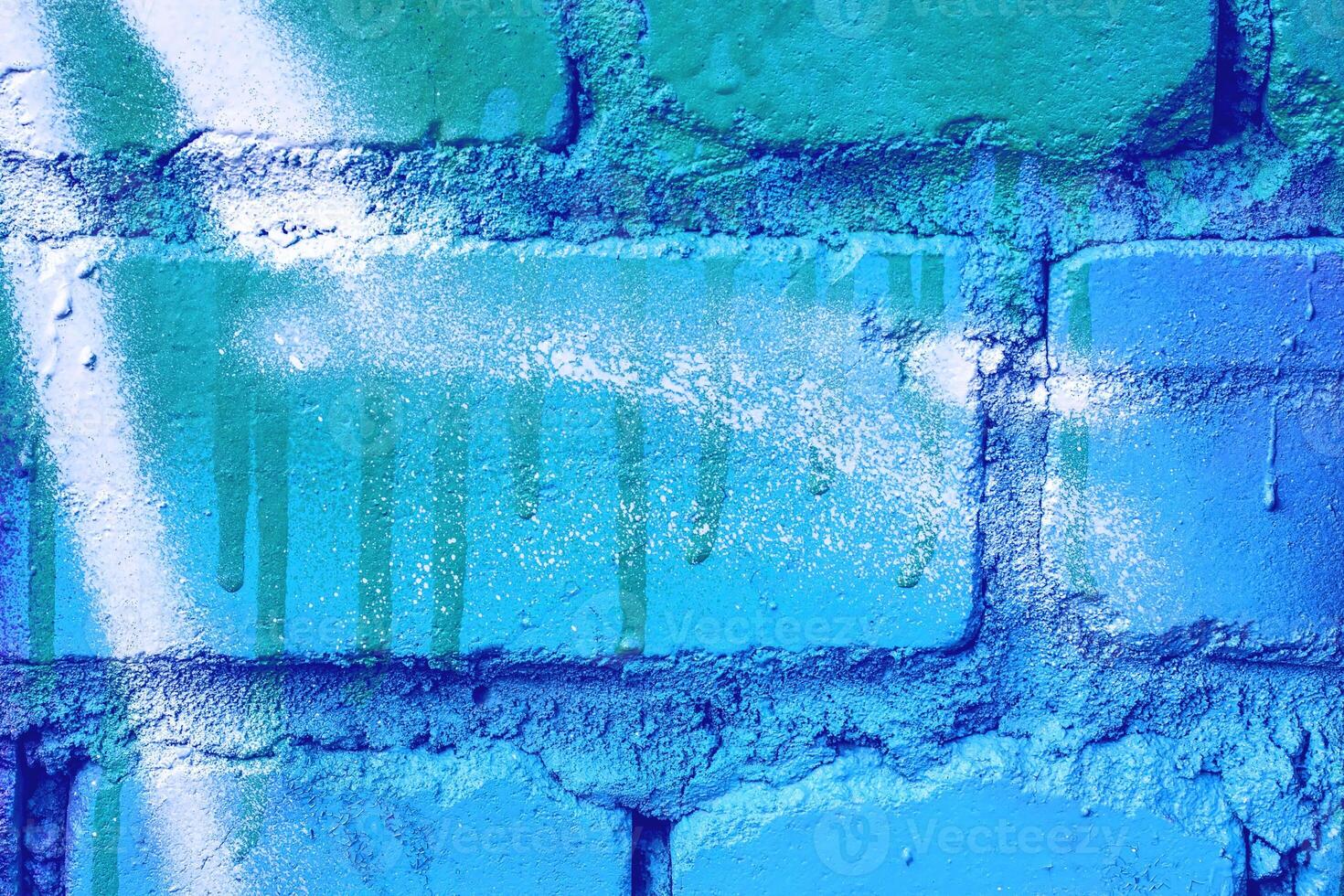 Fragment of colored graffiti painted on a wall. photo