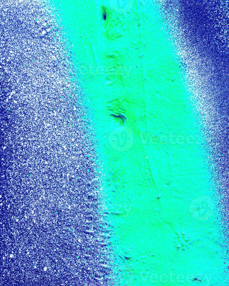 Fragment of colored graffiti painted on a wall. photo