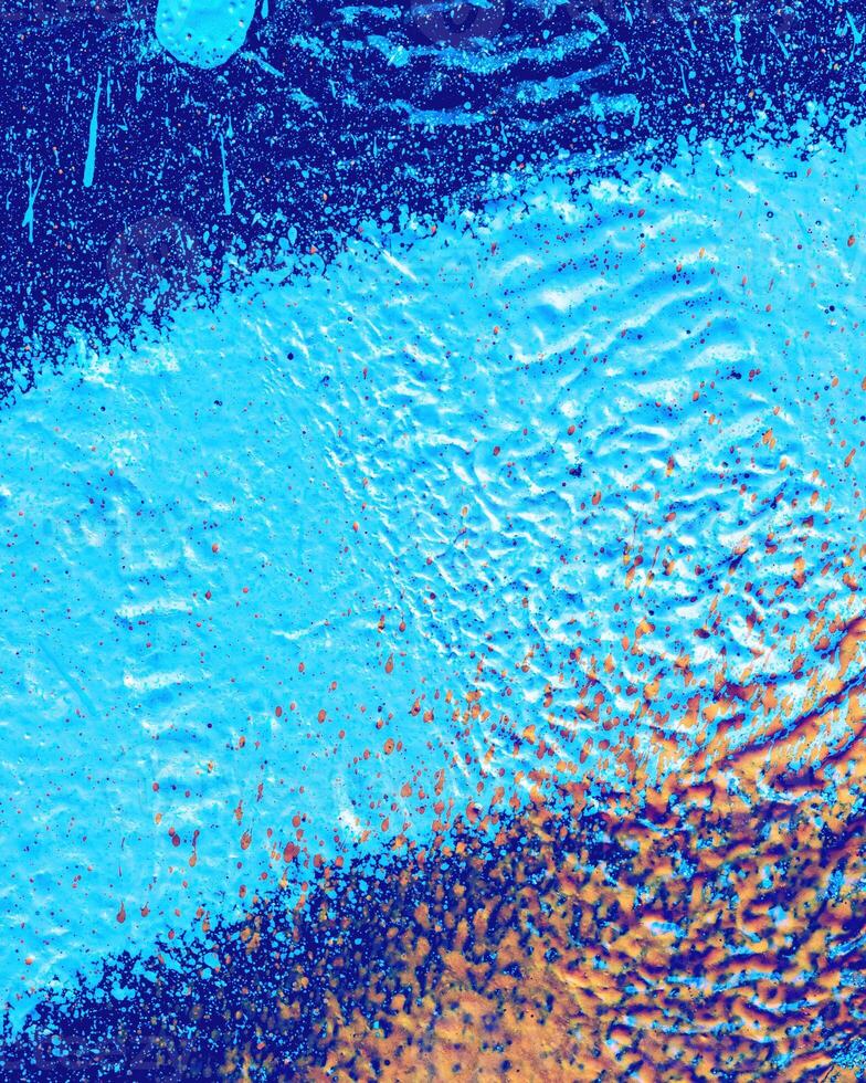 Fragment of colored graffiti painted on a wall. photo