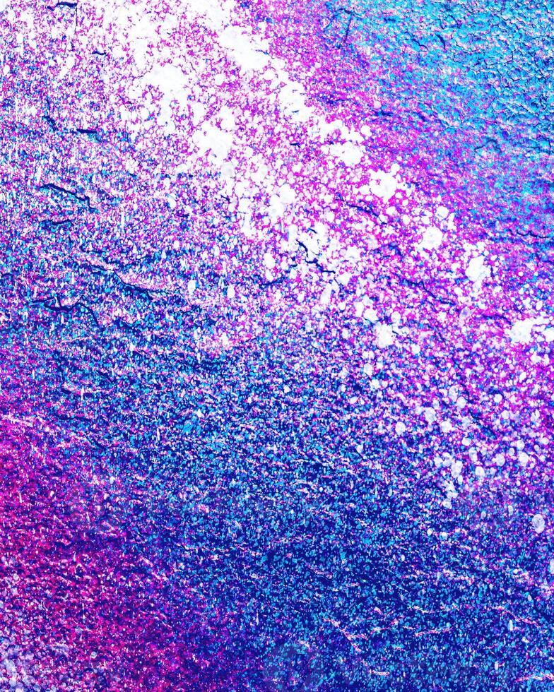 Fragment of colored graffiti painted on a wall. photo