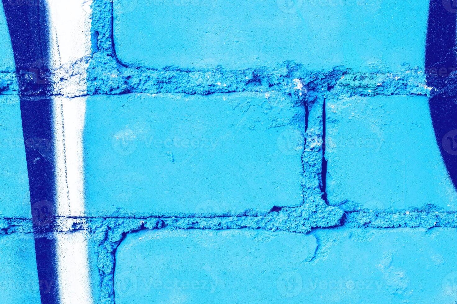 Fragment of colored graffiti painted on a wall. photo