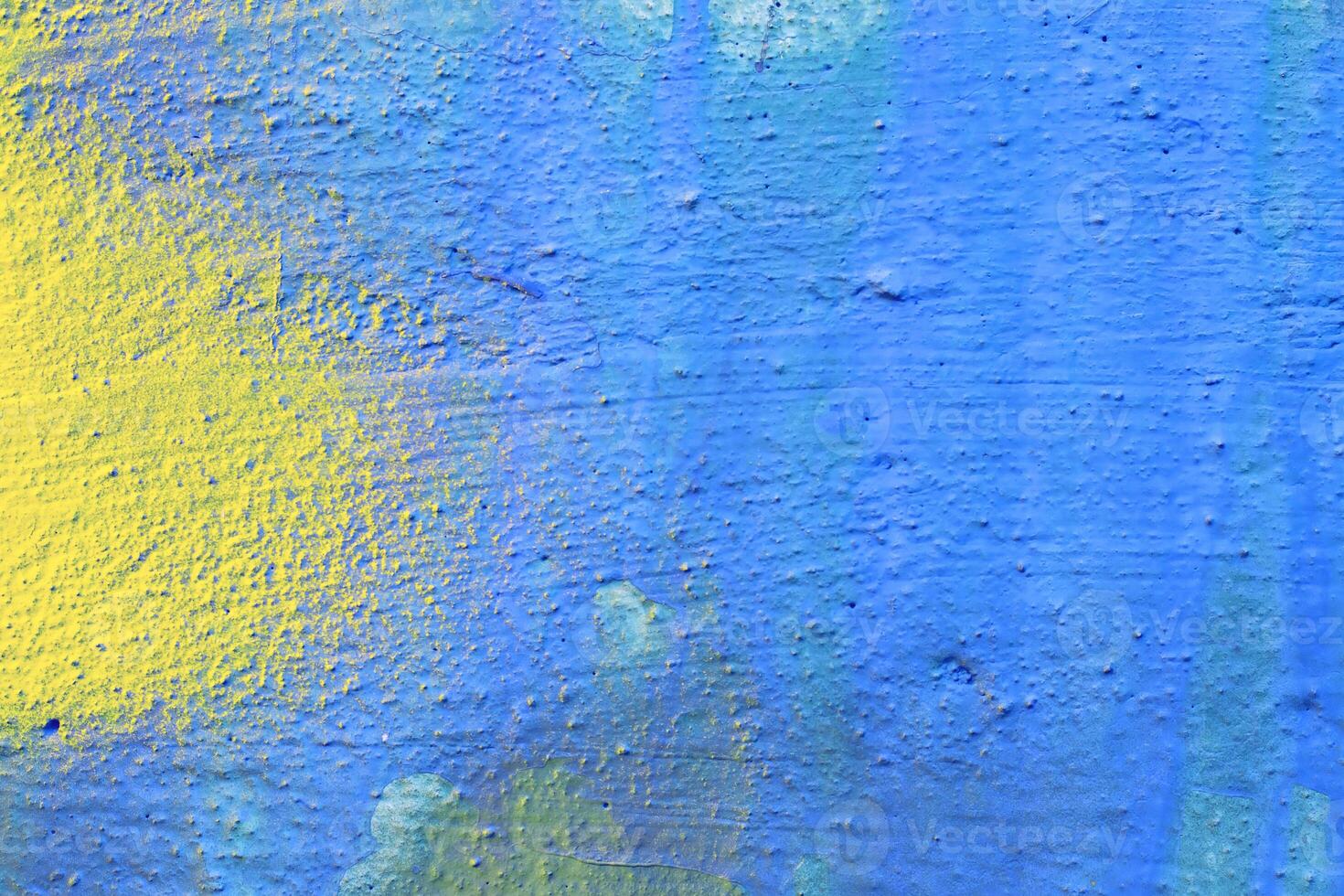 Fragment of colored graffiti painted on a wall. photo