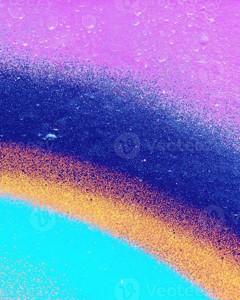 Fragment of colored graffiti painted on a wall. photo