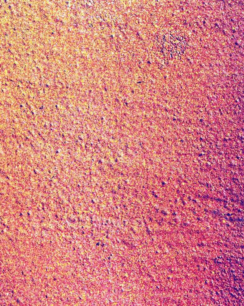 Fragment of colored graffiti painted on a wall. photo