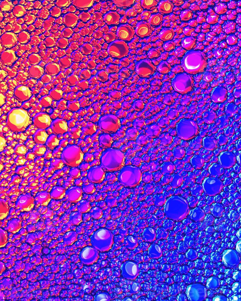 Top view on colorful drops of oil on the water. Circles and ovals. photo