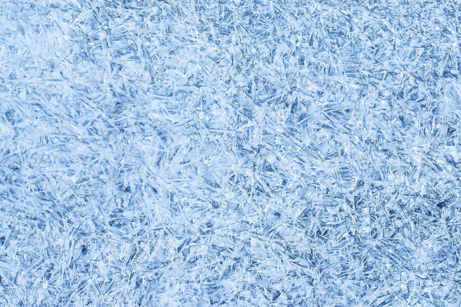 Texture of ice in the winter. Abstract background of frost for design, photographed closeup. photo