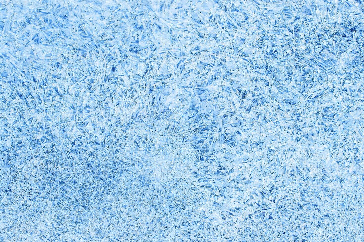 Texture of ice in the winter. Abstract background of frost for design, photographed closeup. photo
