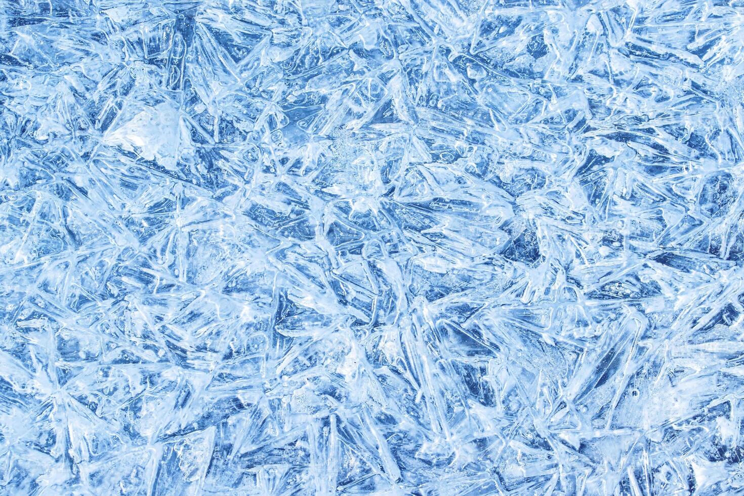 Texture of ice in the winter. Abstract background of frost for design, photographed closeup. photo