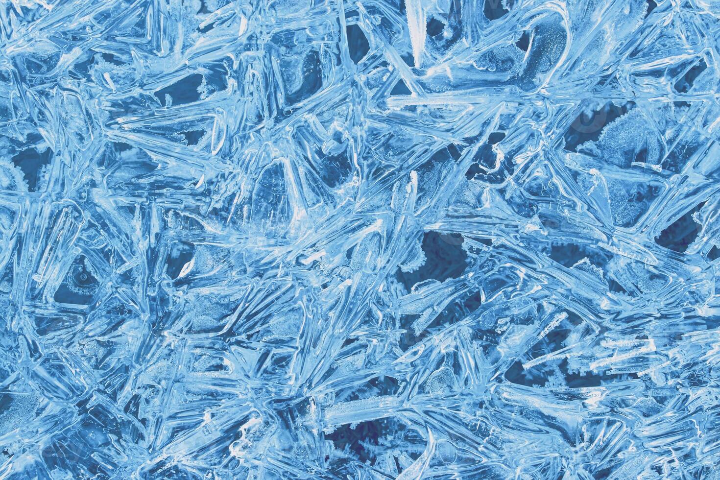 Texture of ice in the winter. Abstract background of frost for design, photographed closeup. photo