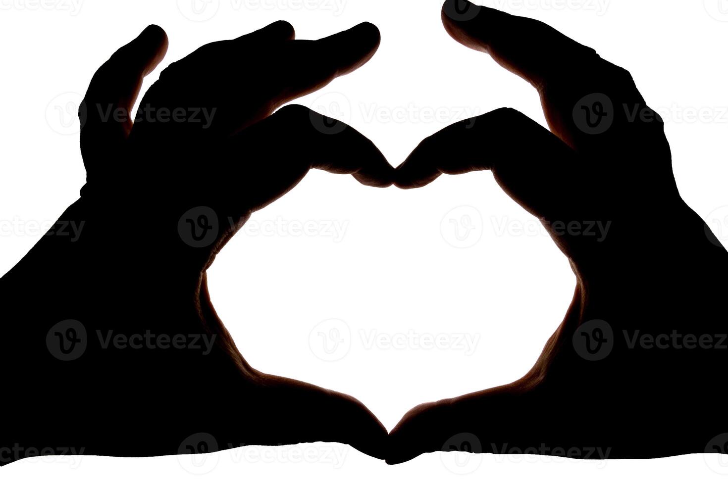 Silhouette of hands showing heart gesture isolated on white background. Blank for design. photo
