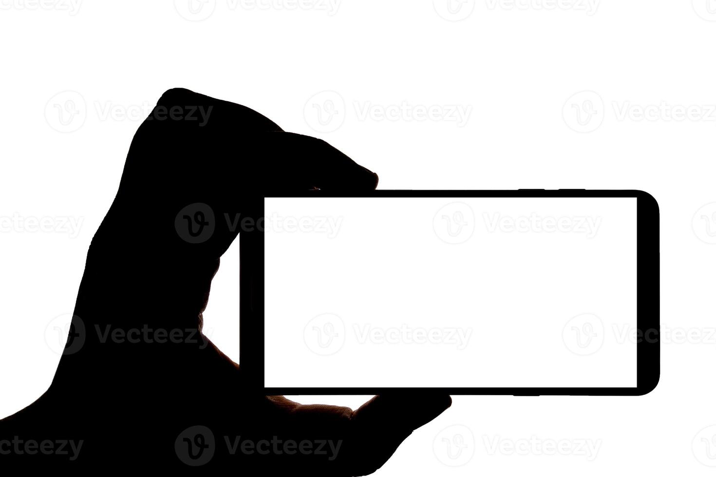Silhouette of hand with smartphone taking picture isolated on white background. Screen with copy space. Blank for design. photo