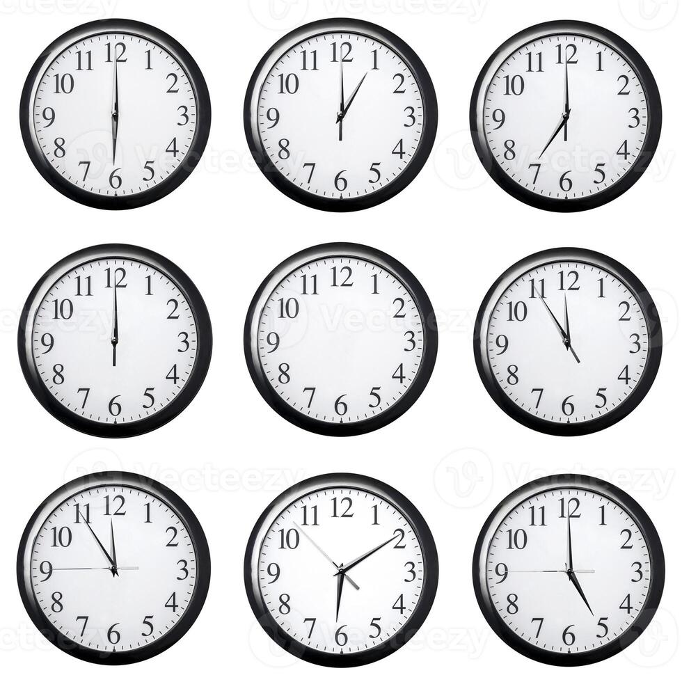 Set of black watch dials with arrows showing different times, isolated on a white backdrop. photo