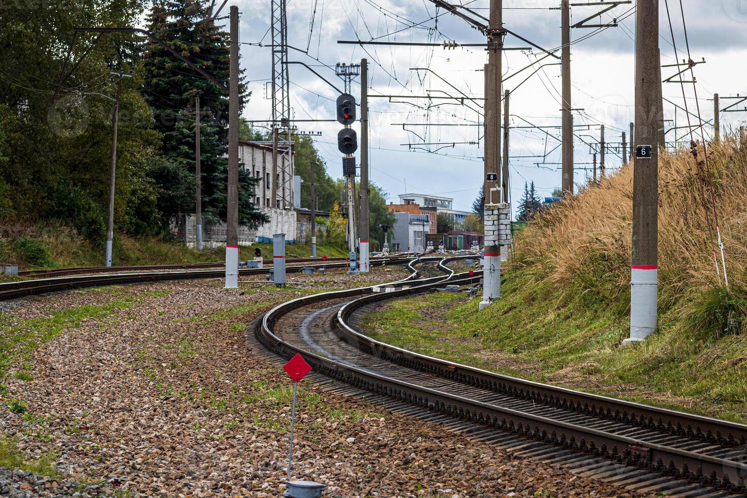 Railway track with rails and sleepers in the countryside. photo