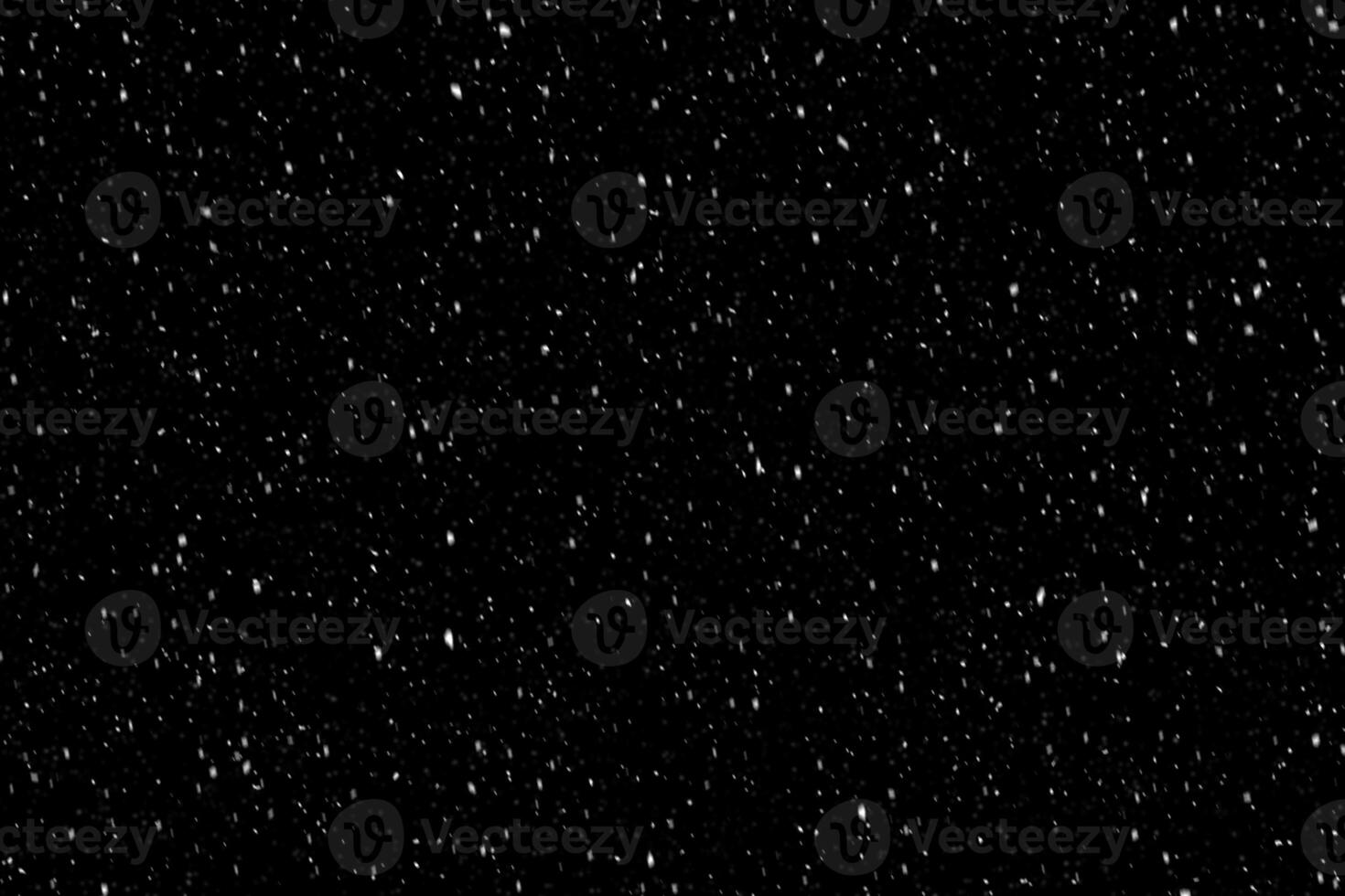 Snow overlay effect on the black background. photo