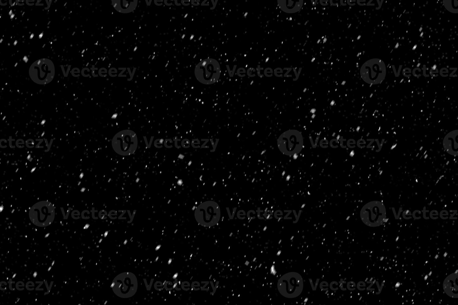 Snow overlay effect on the black background. photo