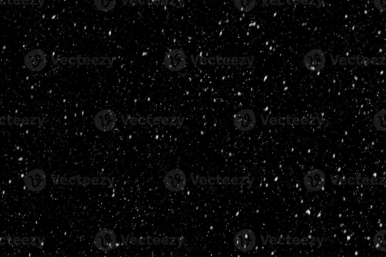 Snow overlay effect on the black background. photo