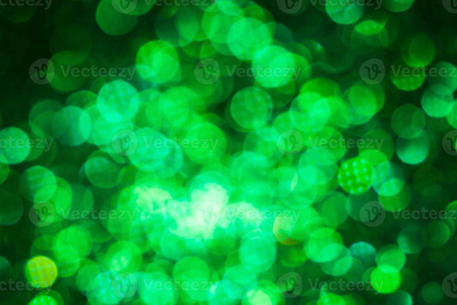 Green lights abstract bokeh backdrop. Chrismas lights bokeh. photo