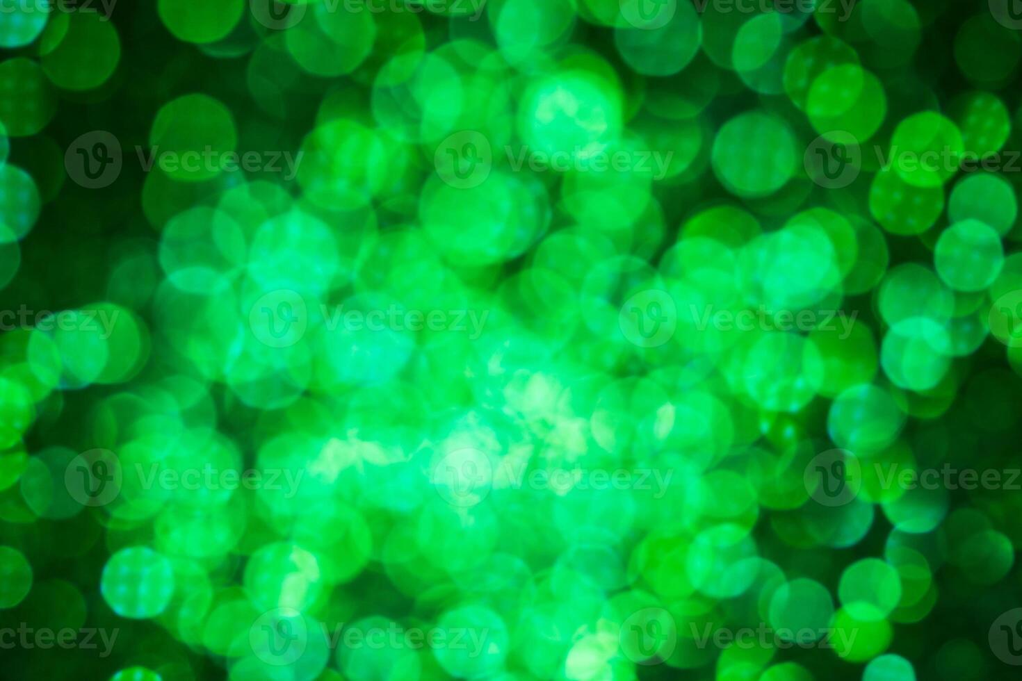 Green lights abstract bokeh backdrop. Chrismas lights bokeh. photo